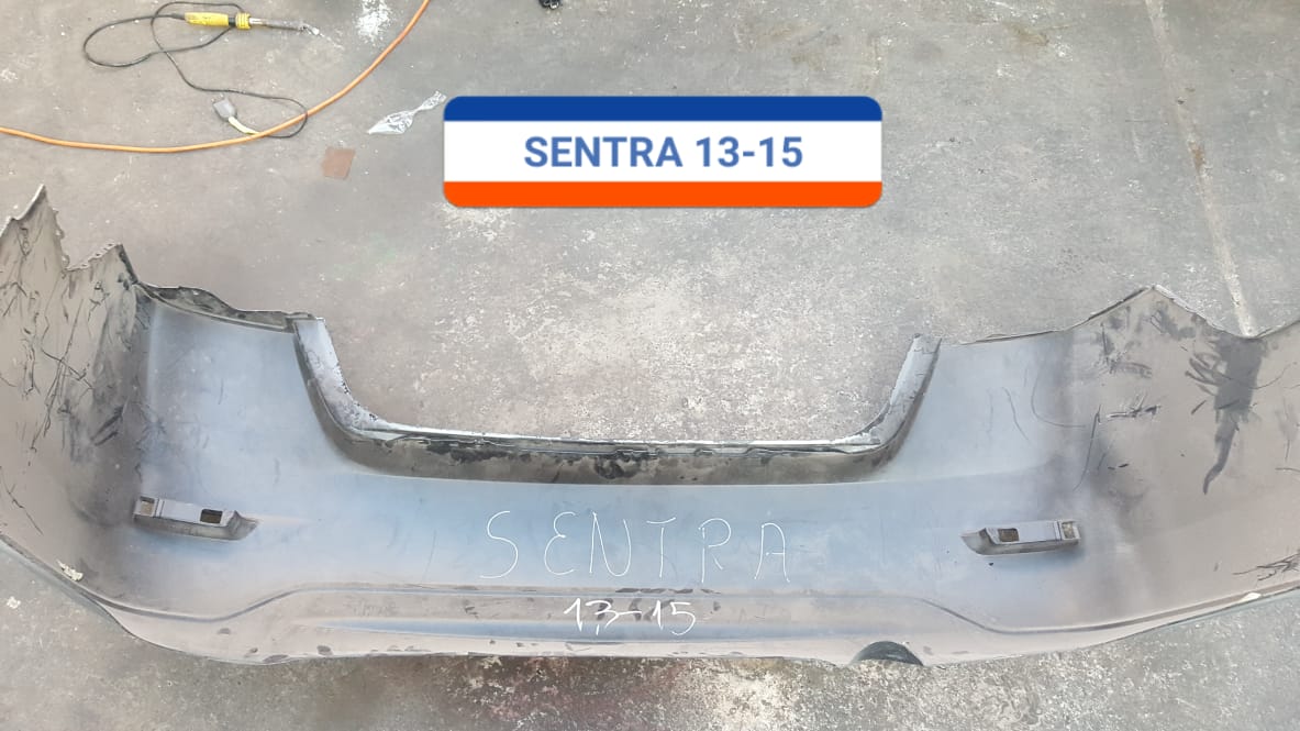 PARACHOQUES POSTERIOR NISSAN SENTRA 2013 AL 2015 CON DETALLE